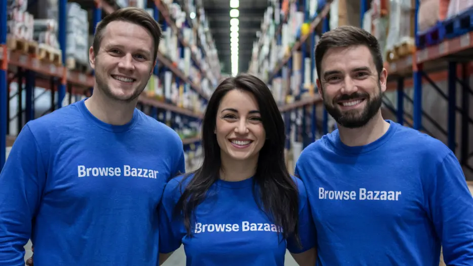 3 Browse Bazaar warehouse team members are standing inside of U.S. fulfillment centre